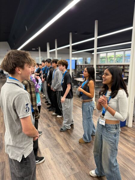 Students connecting face to face